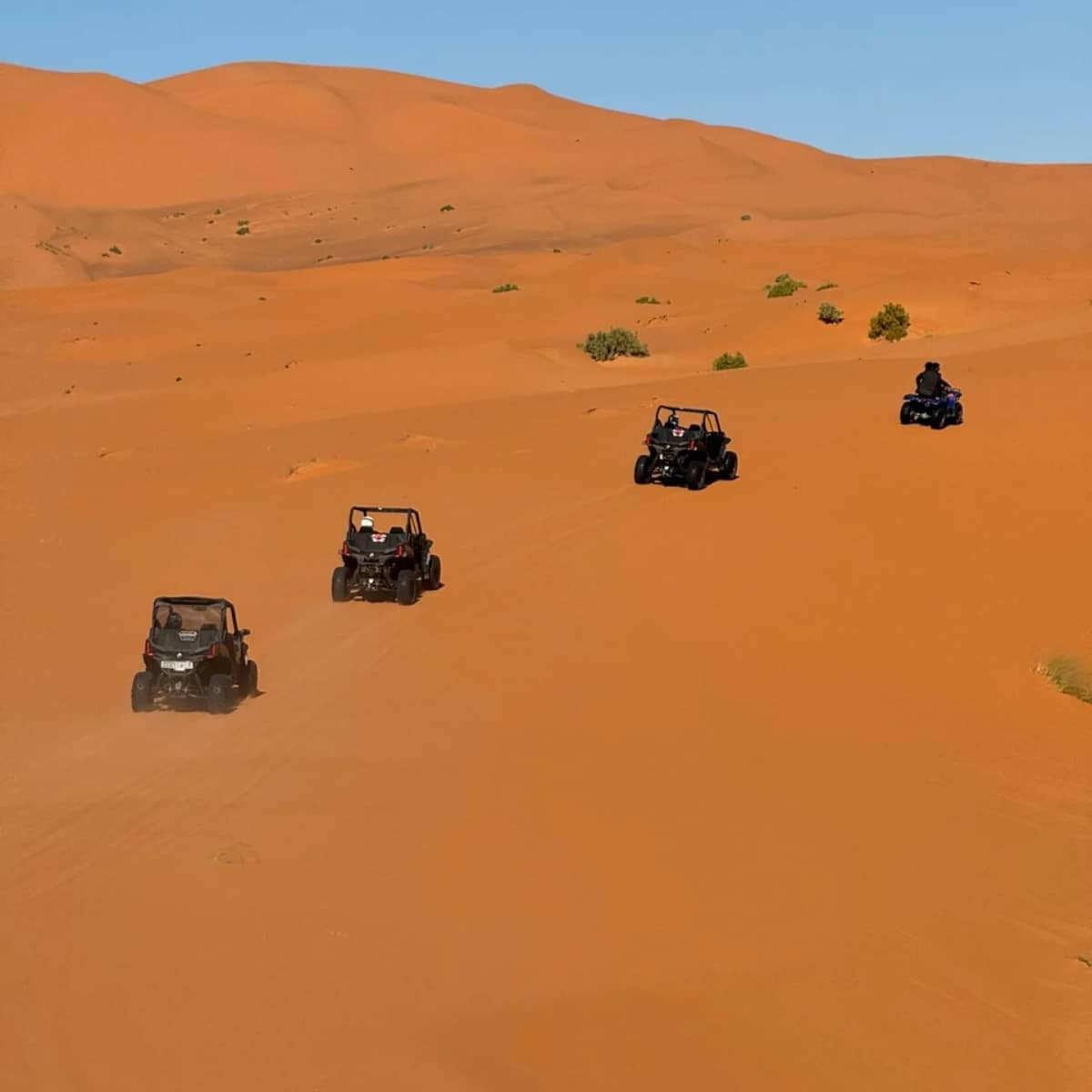 Quad biking adventure in Erg Chebbi Sahara dunes during Fes to Marrakech Desert Tour