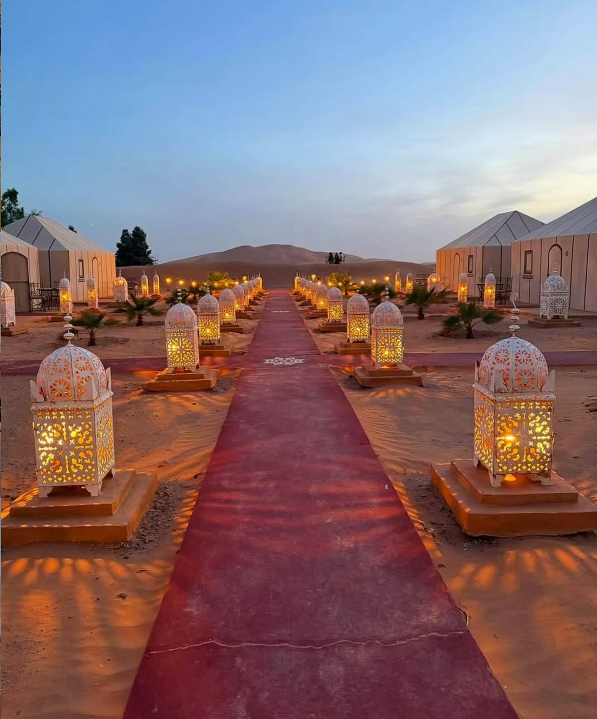 Luxury desert camp surrounded by sand dunes in the Sahara Desert, Morocco