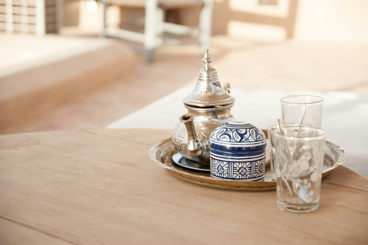 Traditional Moroccan mint tea served in decorated glasses